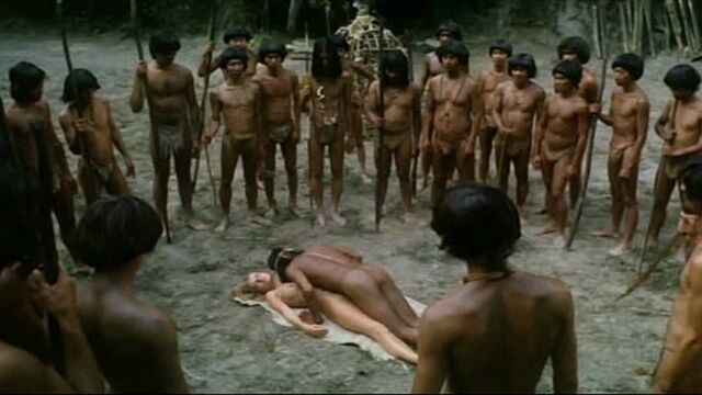 Племя дикарей по очереди насилуют белую девушку (пустили по кругу, насилуют по очереди, кончают толпой в одну, секс дикарей)